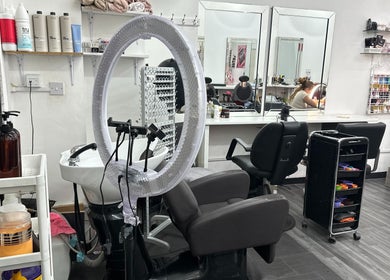 Modern salon interior at Zulymar Beauty & Health, featuring styling stations in London, England, GB.