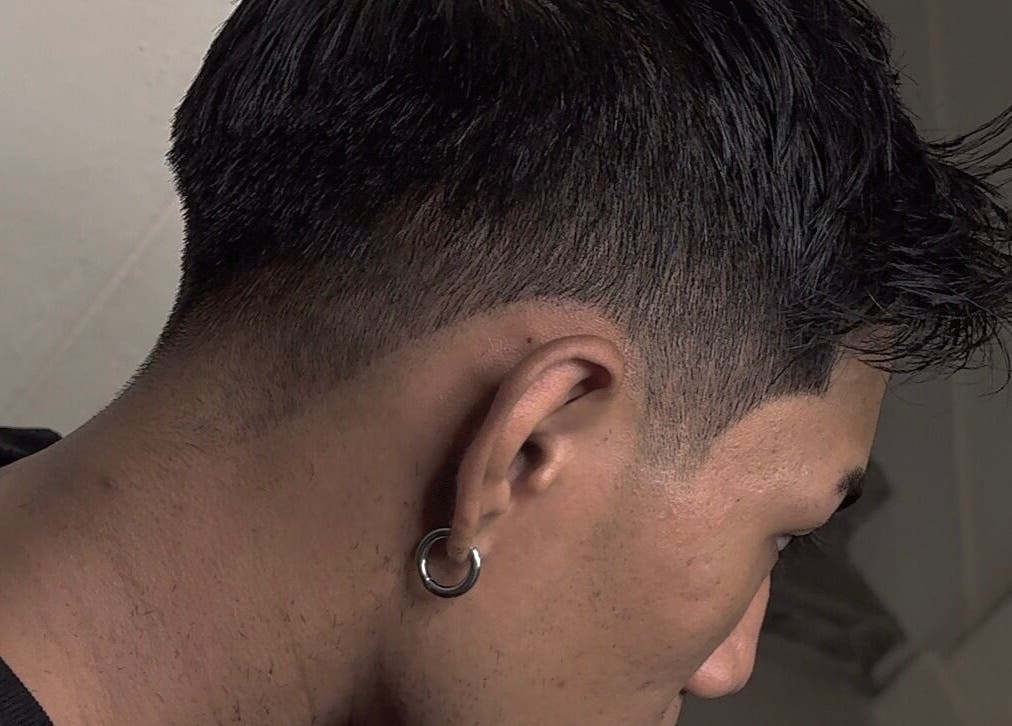 Close-up of a stylish men's haircut at Rascals, Singapore, Singapore, SG, highlighting modern grooming.