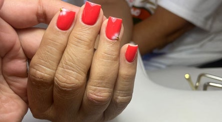 Vibrant red manicure at Shashi Nails, Willemstad, Curaçao, CW offering expert nail care.
