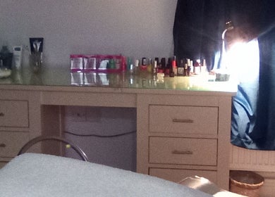 Beauty and Care's stylish nail station in Middlesbrough, England, GB with vibrant polish display.