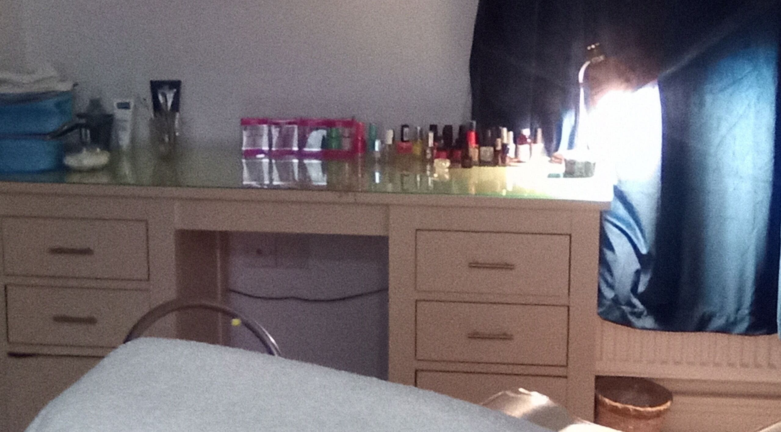 Beauty and Care's stylish nail station in Middlesbrough, England, GB with vibrant polish display.