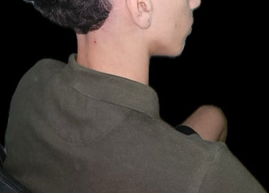Side view of a fresh taper haircut at a_taperz in London, England, GB.