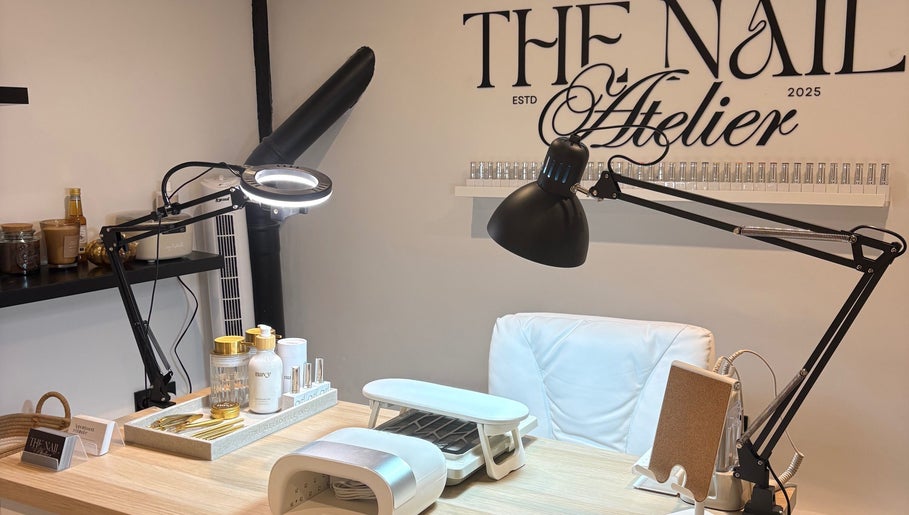 Modern nail station at The Nail Atelier Co., Chelmsford, England, GB, showcasing elegant tools and decor.