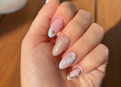Stylish nail art from The Nail Atelier Co. in Chelmsford, England, GB showcasing intricate pastel designs.