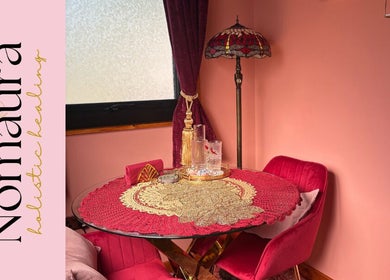 Nomaura's elegant interior with red decor and vintage lamp in Pontypool, Wales, GB.