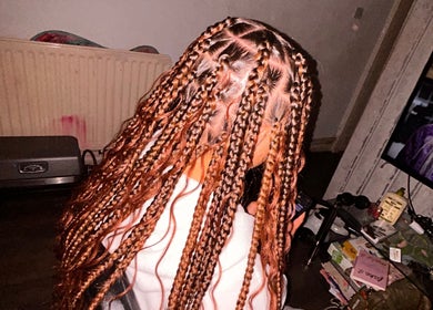 Intricate braided hairstyle at Hairbyreshi, Wolverhampton, England, GB showcasing detailed craftsmanship.