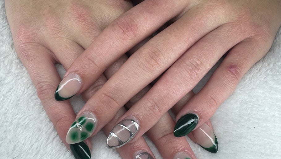 Close-up of intricate green nail art at PICKle your nails, Melbourne, Victoria, AU.