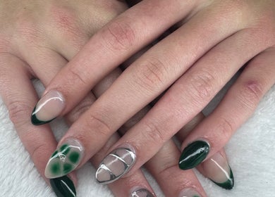 Close-up of intricate green nail art at PICKle your nails, Melbourne, Victoria, AU.