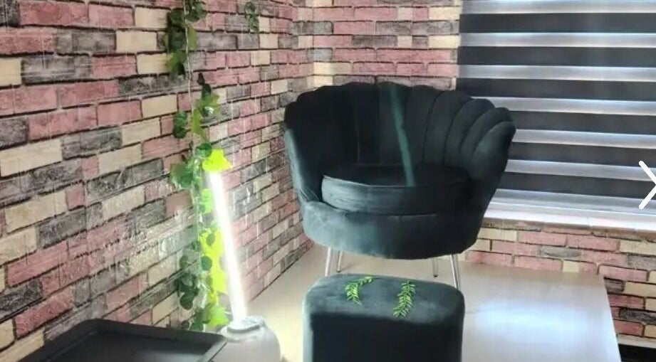 Relaxing chair setup at Nonny Tips & Toes Nail Bar, Queensburgh, Kwazulu-natal, ZA, with stylish decor.