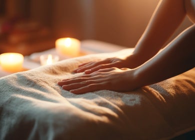 Relaxing massage at TL Foot Spa, Austin, Texas, US with ambient candles setting a soothing atmosphere.