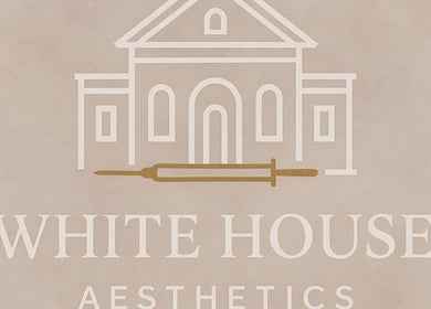 White House Aesthetic's logo showcasing elegant facade design in Tring, England, GB.
