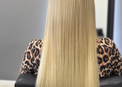 Long, sleek blonde hair at ME TIME STUDIO in Jelgava, LV, showcasing professional styling and beauty care.