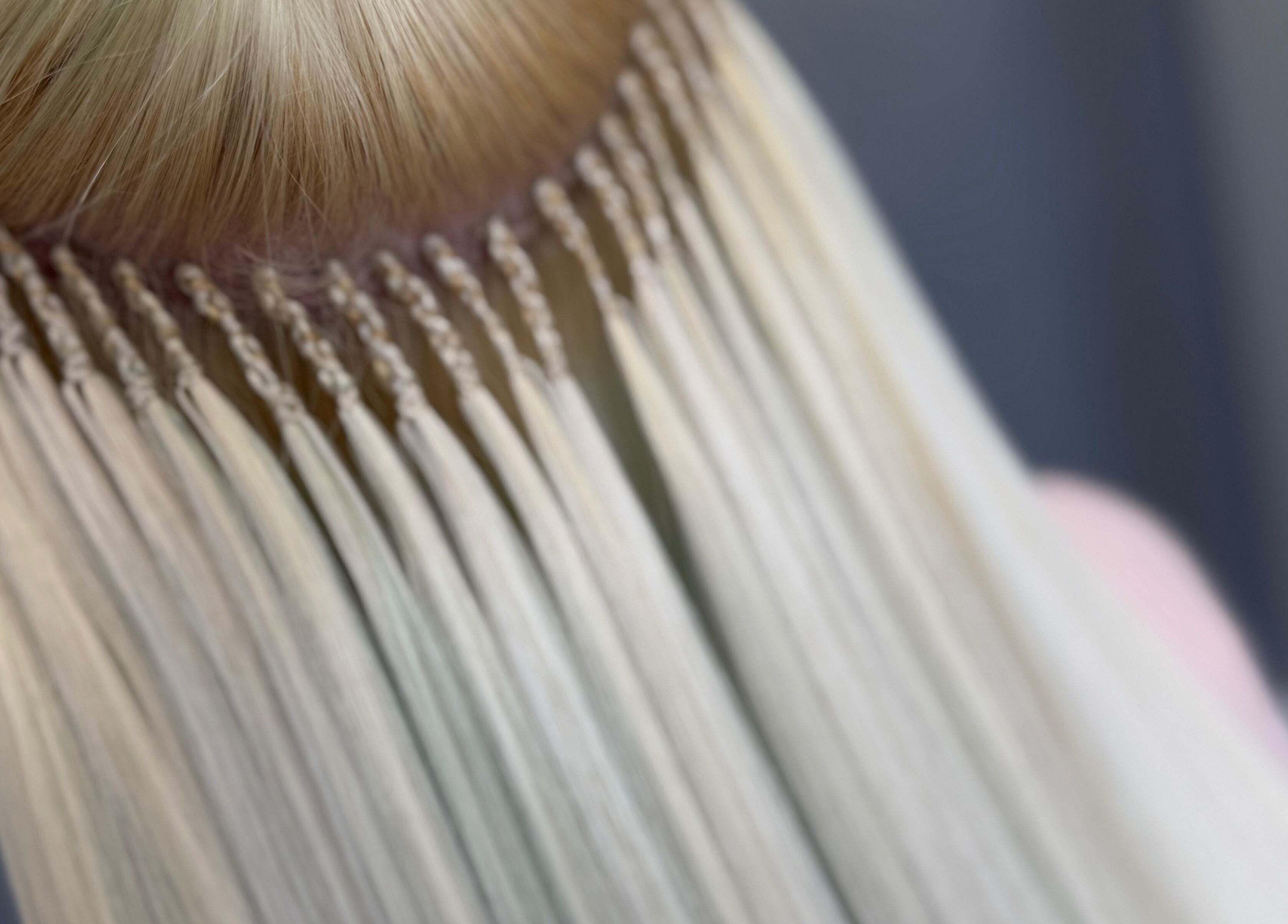 High-quality hair extensions at ME TIME STUDIO in Jelgava, LV, showcasing expert application technique.