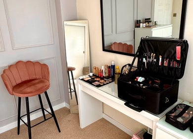 Makeup setup at Beth Ritchie Makeup Artist in Peebles, Scotland, GB with chair and mirror.