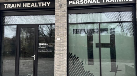 Voorgevel van Tension Treat in Amsterdam, Noord-Holland, NL, met focus op sportmassage en herstel.