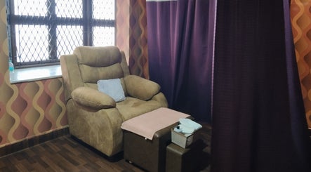 Cozy spa chair at Footvarma in Chennai, Tamil Nadu, IN, offering a serene wellness retreat.