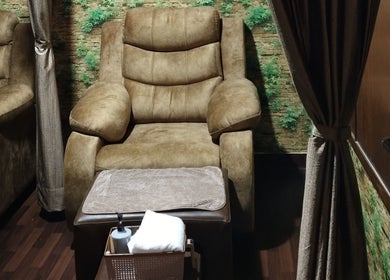 Comfortable massage chair at Footvarma, Chennai, Tamil Nadu, IN, ideal for relaxation and wellness.