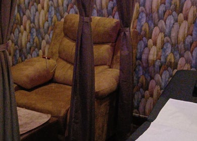 Relaxing massage chair in a serene room at Footvarma, Chennai, Tamil Nadu, IN. Ideal for unwinding and peace.