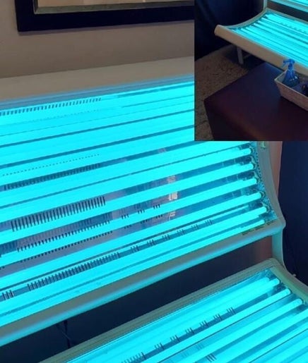 Illuminated tanning beds at D's Hair Salon in Krugersdorp, Gauteng, ZA for a perfect bronze glow.
