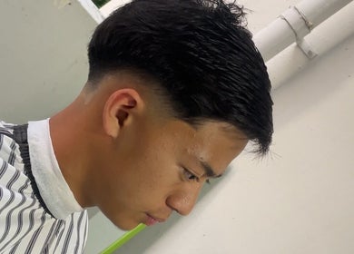 Sleek haircut at gbblendz in Singapore, Singapore, SG showcasing precision grooming.