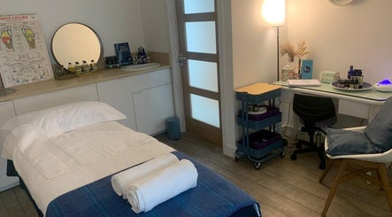 Tranquil therapy room at Cleadon Massage & Reflexology, Cleadon, Village, England, GB with massage bed and essentials.