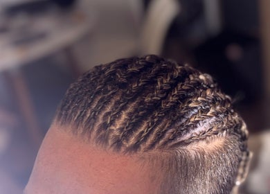 Intricate braided hairstyle at Jades Gorgeous Hair, Leighton Buzzard, England, GB.