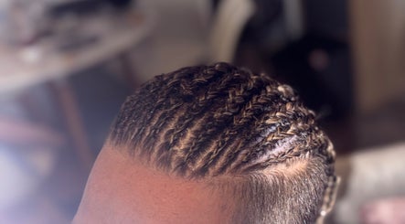 Intricate braided hairstyle at Jades Gorgeous Hair, Leighton Buzzard, England, GB.