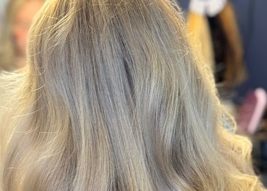 Blonde hair styled elegantly at Jades Gorgeous Hair, Leighton Buzzard, England, GB.
