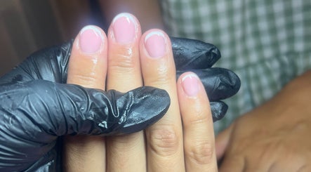 Freshly manicured nails with French tips at The Nail Lab Essex, Witham, England, GB.