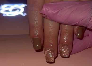Beautiful floral nail art at Built By Mikaela, Skewen, Wales, GB, showcasing intricate design and fresh manicure.