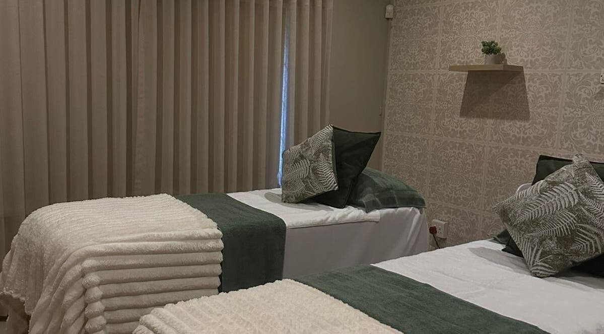 Cozy treatment beds at Imar’ Amani Herbal Alchemy in Pretoria, Gauteng, ZA, offering tranquil relaxation.