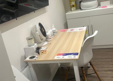 Modern workspace at Rosem Health Clinic, Nottingham, England, GB, showcasing a clean and organized setup.