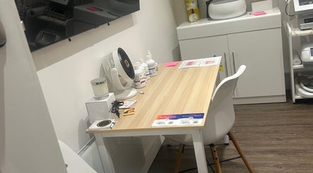 Modern workspace at Rosem Health Clinic, Nottingham, England, GB, showcasing a clean and organized setup.