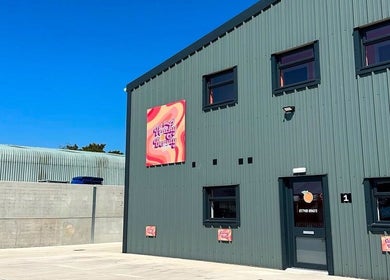 Exterior view of Nails by Caroline x at Somerton, England, GB under a clear blue sky.