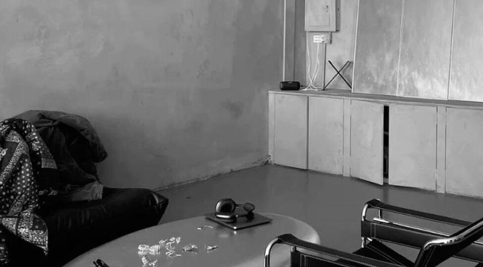 Modern lounge area at Mac.inkd in Philadelphia, Pennsylvania, US, showcasing sleek decor and stylish seating.