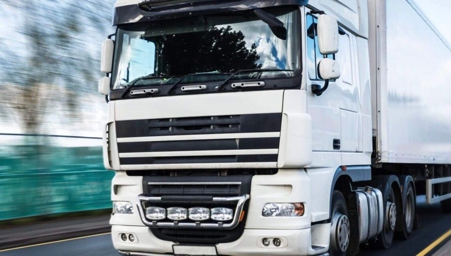 A white truck on a highway near Vitalink Medical, Preston, England, GB.
