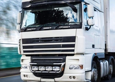 A white truck on a highway near Vitalink Medical, Preston, England, GB.