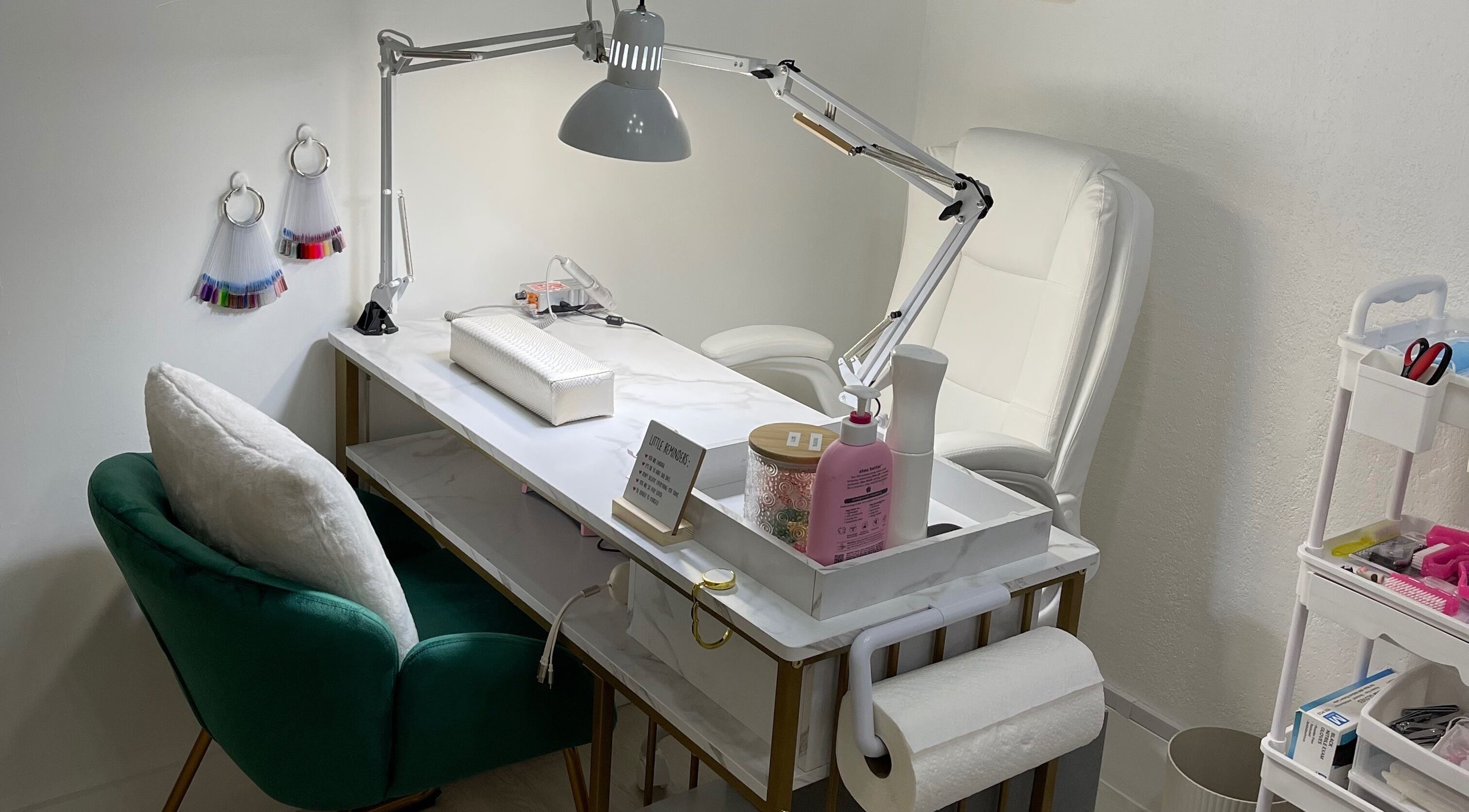 Elegant nail station at VP Nail Artist with plush chairs and modern decor, located in Miami, Florida, US.