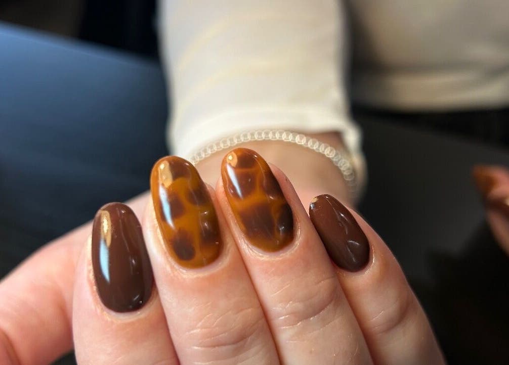 Brown tortoiseshell nail art at Femme Lounge, South Lanarkshire, Scotland, GB.