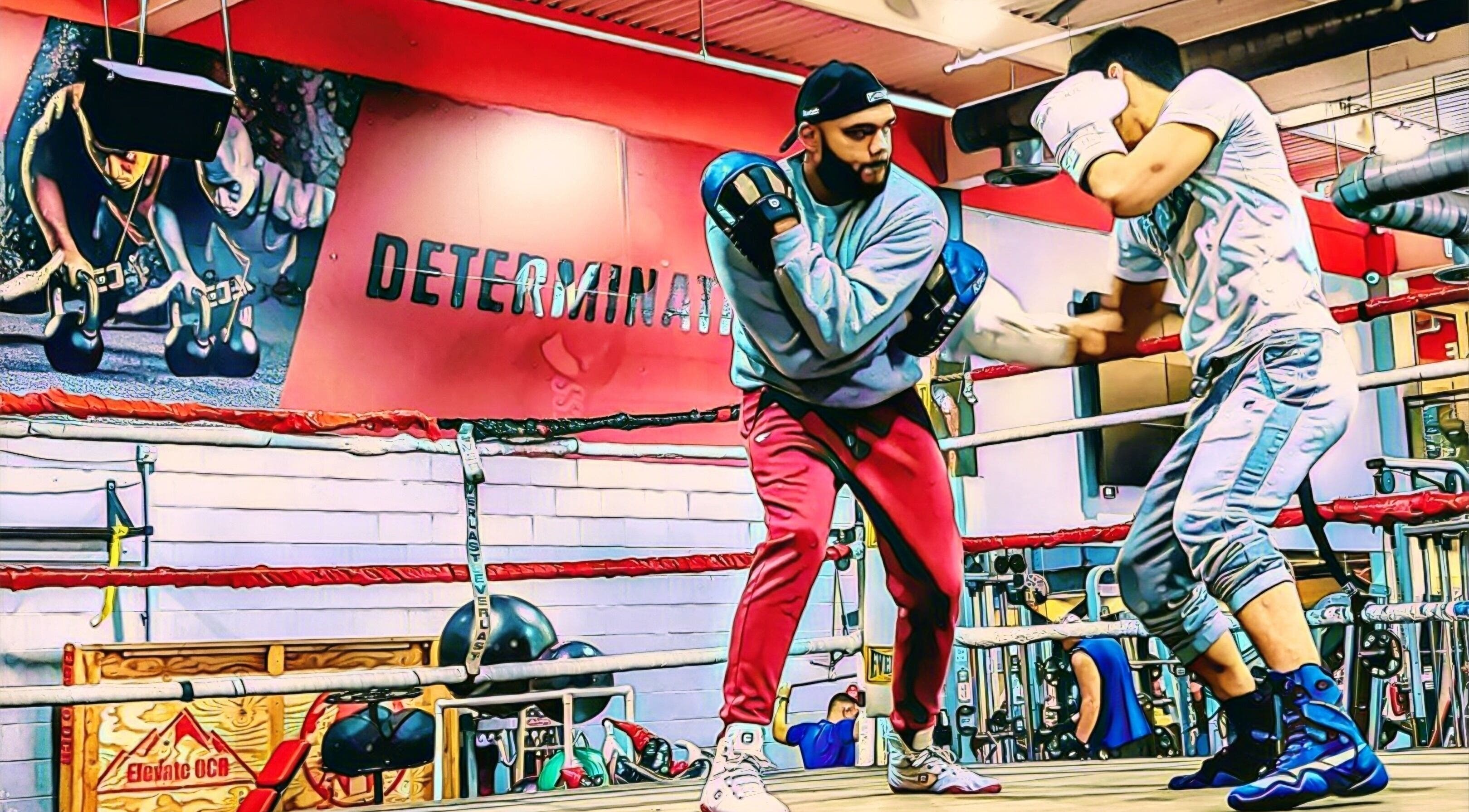 Boxers sparring in a lively gym at The Flow State Method LLC in Branchburg, New Jersey, US.