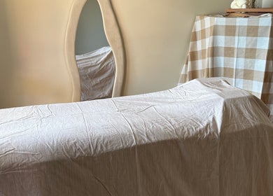 Massage table at Refined Beauty by Kate, Worrigee, New South Wales, AU creating a tranquil treatment space.