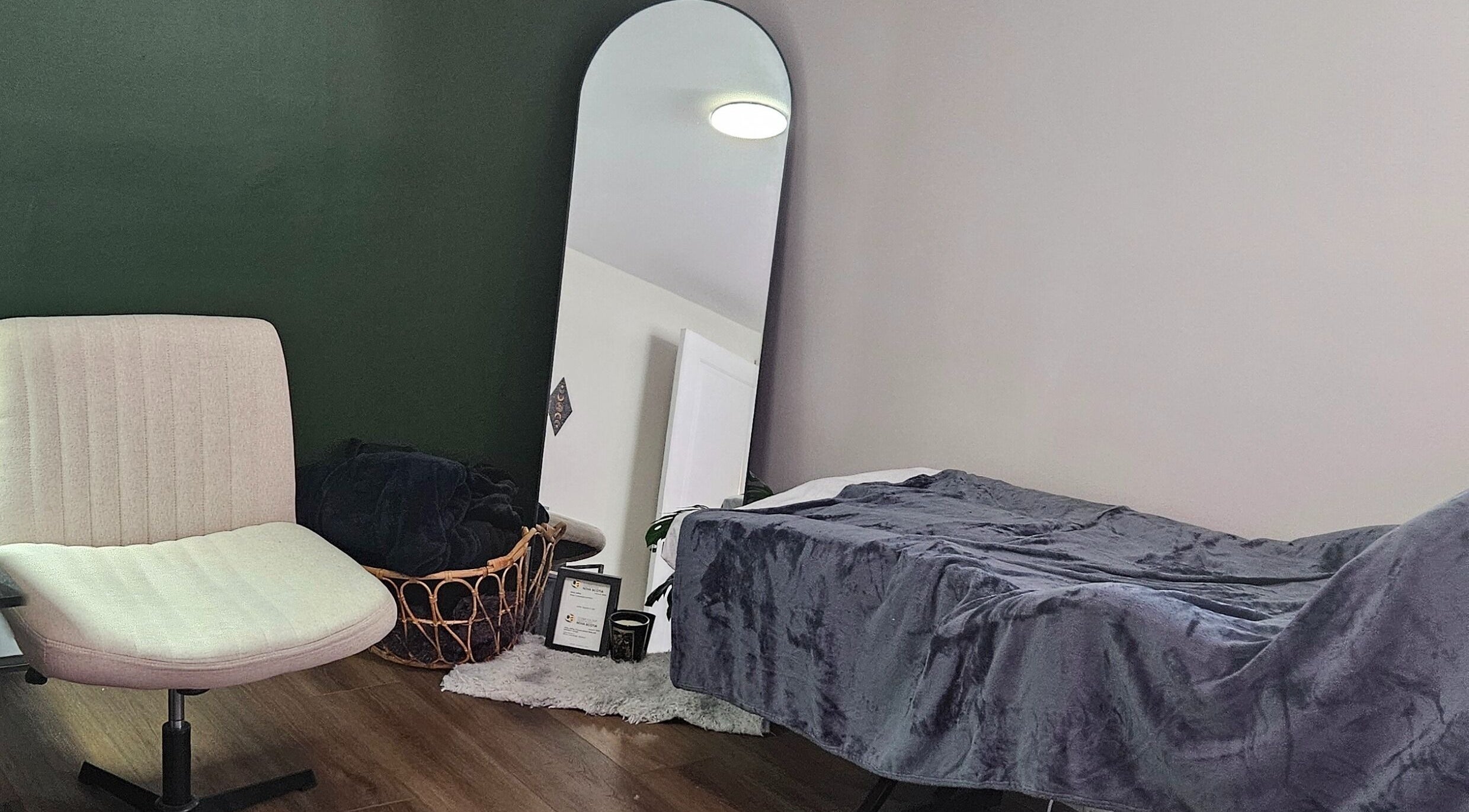Cozy therapy room at Tranquil Beauty Lounge (Elmsdale), featuring a plush chair and mirror. Elmsdale, Nova Scotia, CA.