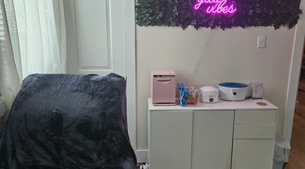Relaxing area with 'good vibes' sign at Tranquil Beauty Lounge (Elmsdale), Elmsdale, Nova Scotia, CA.