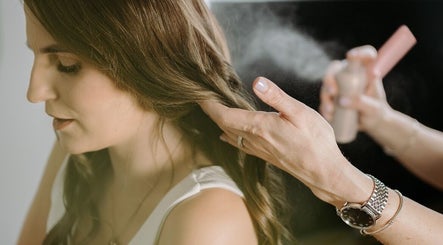 Stylist perfecting hair at Glam Room, Carrick-on-Shannon, County Leitrim, IE.