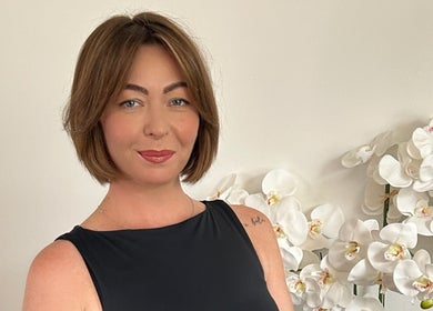 Hairstylist Diana Borisenkova at Carrick-on-Shannon, County Leitrim, IE with a chic bob haircut and white orchids.