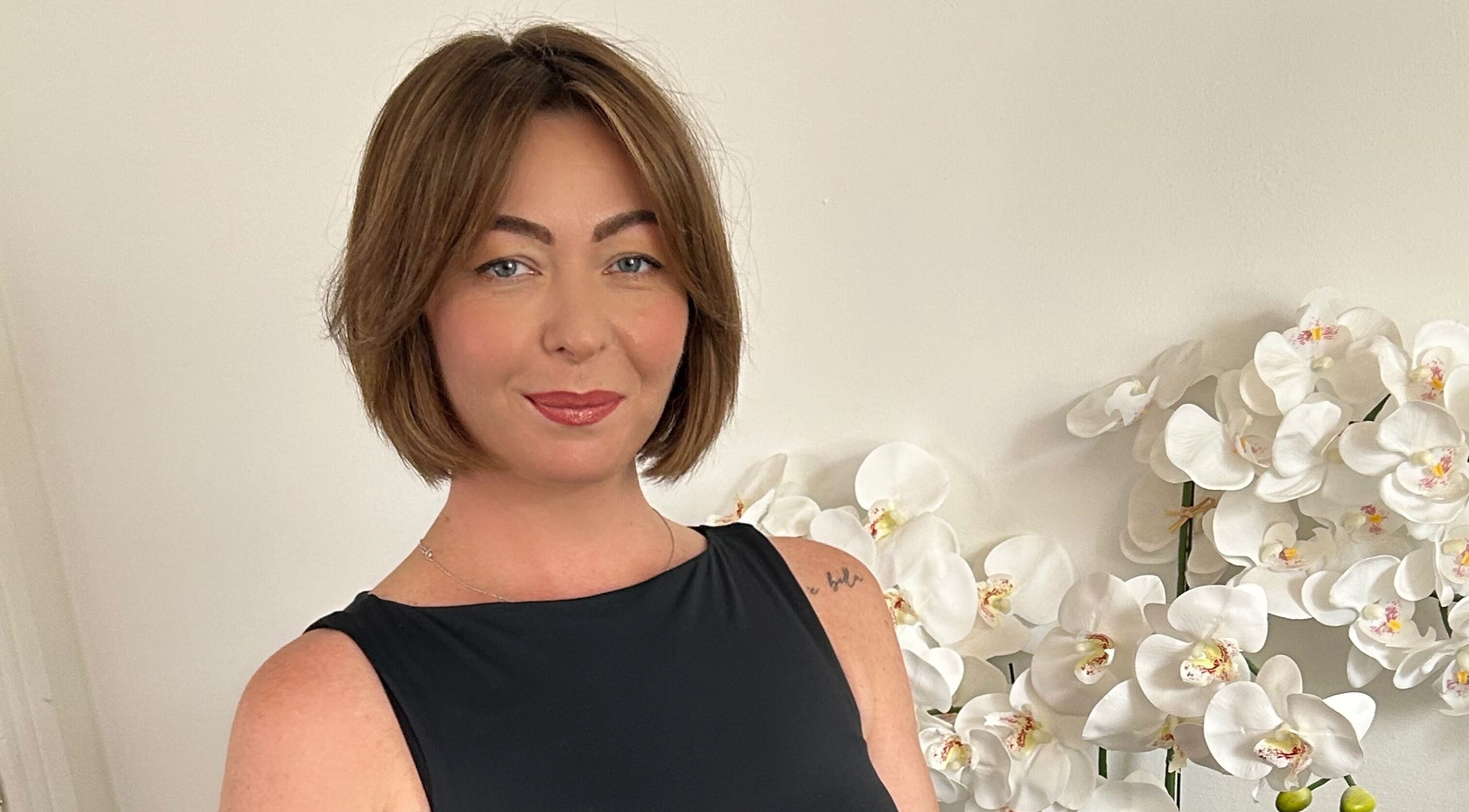 Hairstylist Diana Borisenkova at Carrick-on-Shannon, County Leitrim, IE with a chic bob haircut and white orchids.