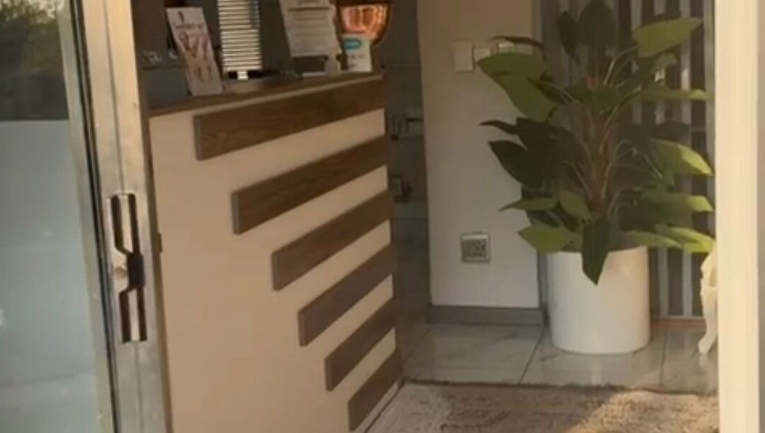 Chic entrance to Lashes by Latoya, Midrand, Gauteng, ZA, featuring stylish decor and indoor plant.
