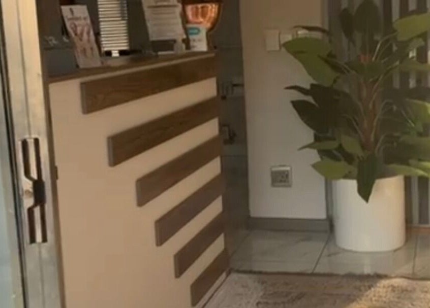 Chic entrance to Lashes by Latoya, Midrand, Gauteng, ZA, featuring stylish decor and indoor plant.