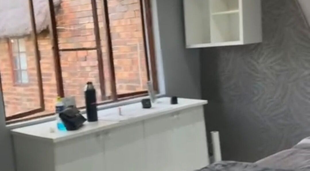 A bright, cozy room at Lashes by Latoya, Midrand, Gauteng, ZA, featuring modern decor and large windows.