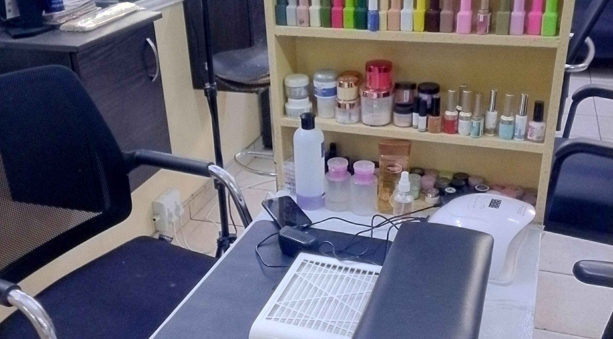 Nail station at Cloud1nails and Beauty Studio, Vanderbijlpark, Gauteng, ZA, with polish colors displayed.